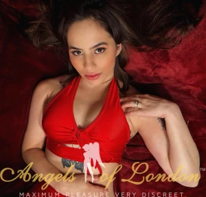 London escort Feijova in red top