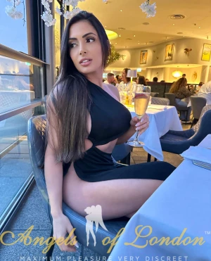 London escort Lasca in black dress