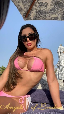 London escort Lasca in pink bikini