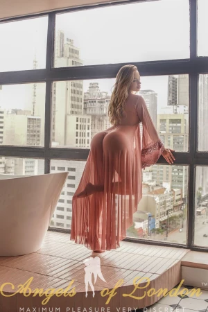 London escort Dinamica in see through gown