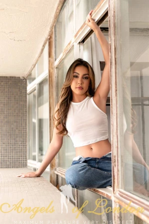 London escort Firmini in white top